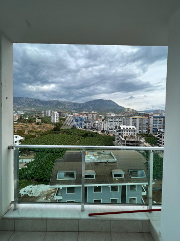 Апартаменты на высоком этаже с планировкой 1+1 в районе Махмутлар,75м2 - Ракурс 17