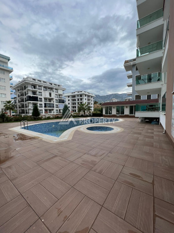 Апартаменты на высоком этаже с планировкой 1+1 в районе Махмутлар,75м2 - Ракурс 18