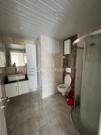 Апартаменты на высоком этаже с планировкой 1+1 в районе Махмутлар,75м2 - Ракурс 27