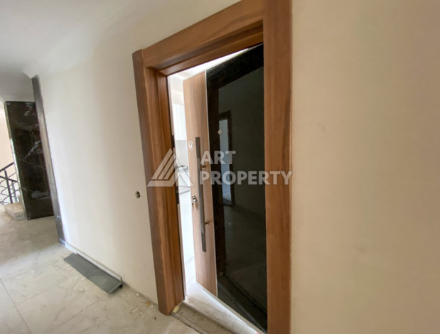 Апартаменты в новом доме в районе Оба с планировкой 1+1,60м2 - Ракурс 2