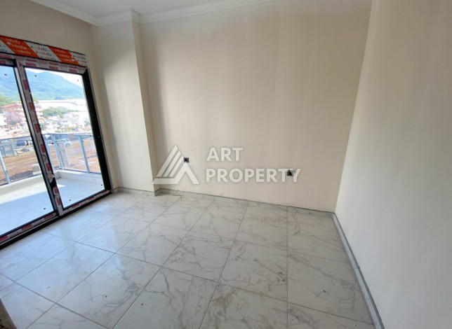 Апартаменты в новом доме в районе Оба с планировкой 1+1,60м2 - Ракурс 3