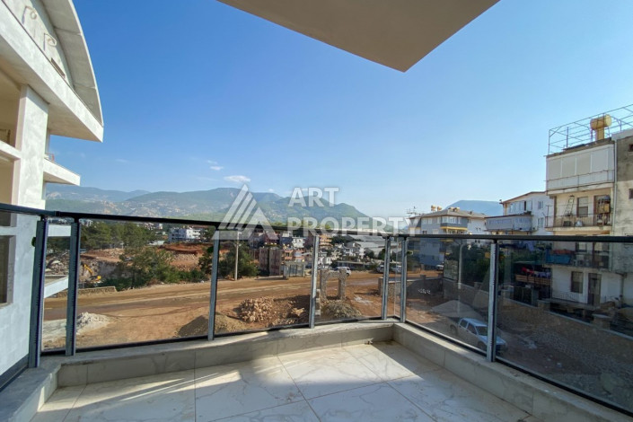 Апартаменты в новом доме в районе Оба с планировкой 1+1,60м2 - Ракурс 10