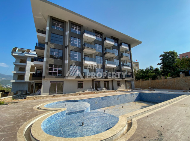 Апартаменты в новом доме в районе Оба с планировкой 1+1,60м2 - Ракурс 11