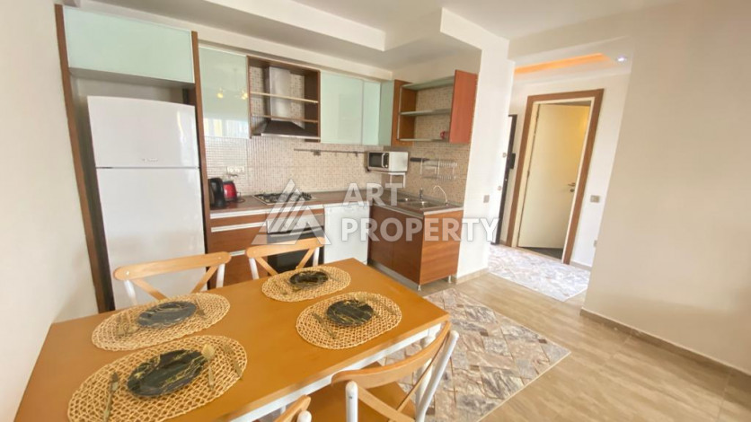 Апартаменты в курортном районе Махмутлар, с планировкой 1+1, 80м2 - Ракурс 2