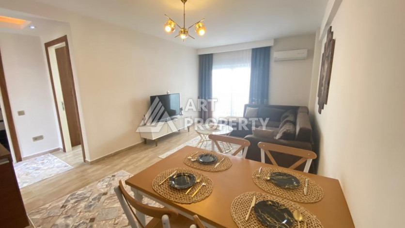 Апартаменты в курортном районе Махмутлар, с планировкой 1+1, 80м2 - Ракурс 3