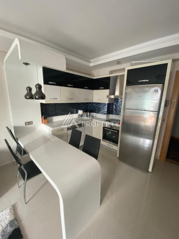 Квартира в роскошном жилом комплексе с полной инфраструктурой в районе Махмутлар, планировка 1+1, 68м2 - Ракурс 12