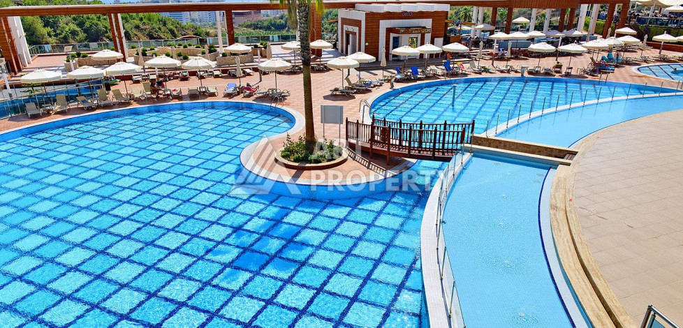 Квартира в роскошном жилом комплексе с полной инфраструктурой в районе Махмутлар, планировка 1+1, 68м2 - Ракурс 7