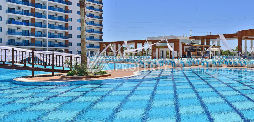 Квартира в роскошном жилом комплексе с полной инфраструктурой в районе Махмутлар, планировка 1+1, 68м2 - Ракурс 45