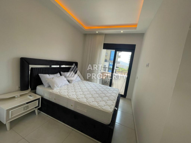 Меблированная квартира в современном жилом комплексе с планировкой 1+1 в районе Махмутлар, 56м2 - Ракурс 5