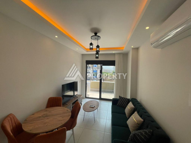 Меблированная квартира в современном жилом комплексе с планировкой 1+1 в районе Махмутлар, 56м2 - Ракурс 8