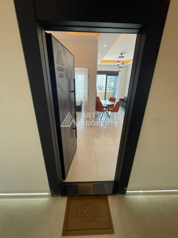 Меблированная квартира в современном жилом комплексе с планировкой 1+1 в районе Махмутлар, 56м2 - Ракурс 10