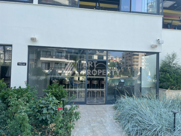 Меблированная квартира в современном жилом комплексе с планировкой 1+1 в районе Махмутлар, 56м2 - Ракурс 17