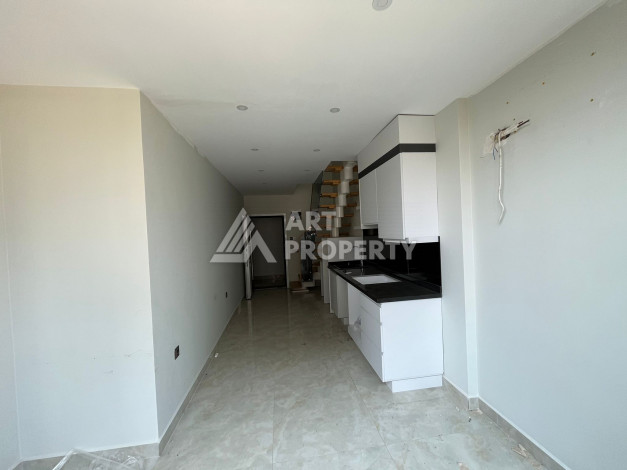 Дуплекс на первой береговой линии с планировкой 1+1 в курортном районе Махмутлар, 50м2 - Ракурс 5