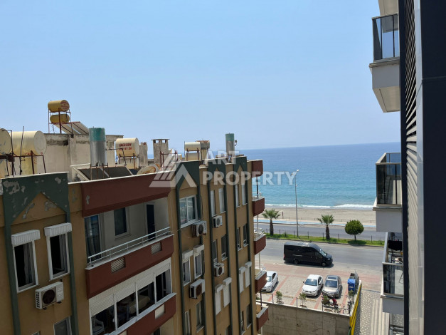 Дуплекс на первой береговой линии с планировкой 1+1 в курортном районе Махмутлар, 50м2 - Ракурс 24