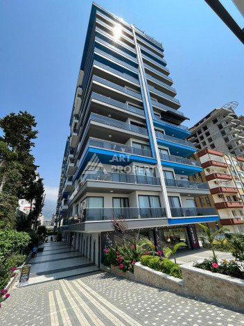 Дуплекс на первой береговой линии с планировкой 1+1 в курортном районе Махмутлар, 50м2 - Ракурс 25