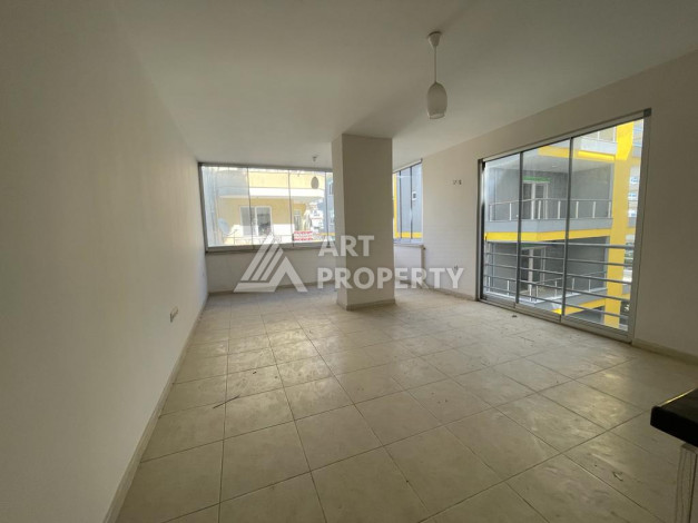 Квартира без мебели на центральной улице в районе Махмутлар с планировкой 1+1, 55м2 - Ракурс 3