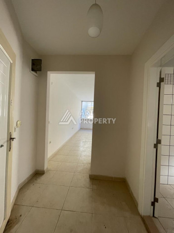 Квартира без мебели на центральной улице в районе Махмутлар с планировкой 1+1, 55м2 - Ракурс 7