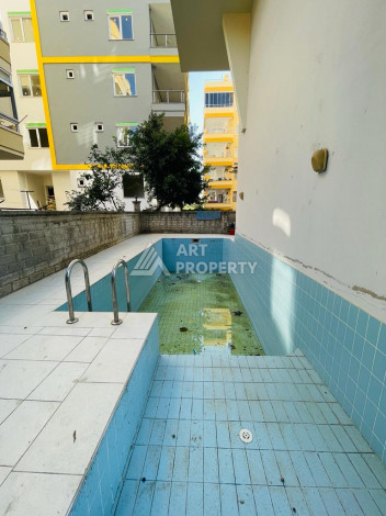 Квартира без мебели на центральной улице в районе Махмутлар с планировкой 1+1, 55м2 - Ракурс 10