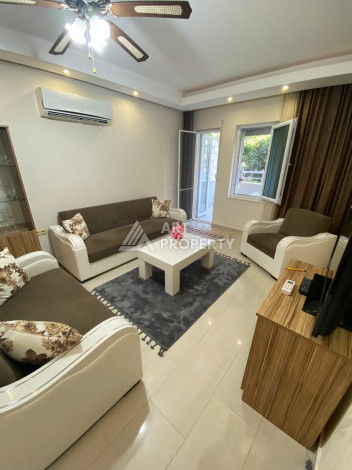 Апартаменты с мебелью с выходом в сад в районе Махмутлар с планировкой 1+1, 65м2 - Ракурс 6