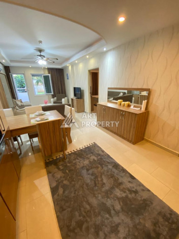 Апартаменты с мебелью с выходом в сад в районе Махмутлар с планировкой 1+1, 65м2 - Ракурс 8