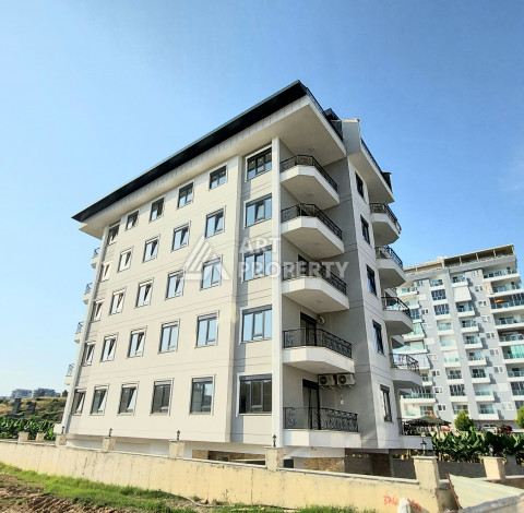 Меблированная квартира в новом доме в районе Махмутлар с планировкой 1+1, 5м2 - Ракурс 0