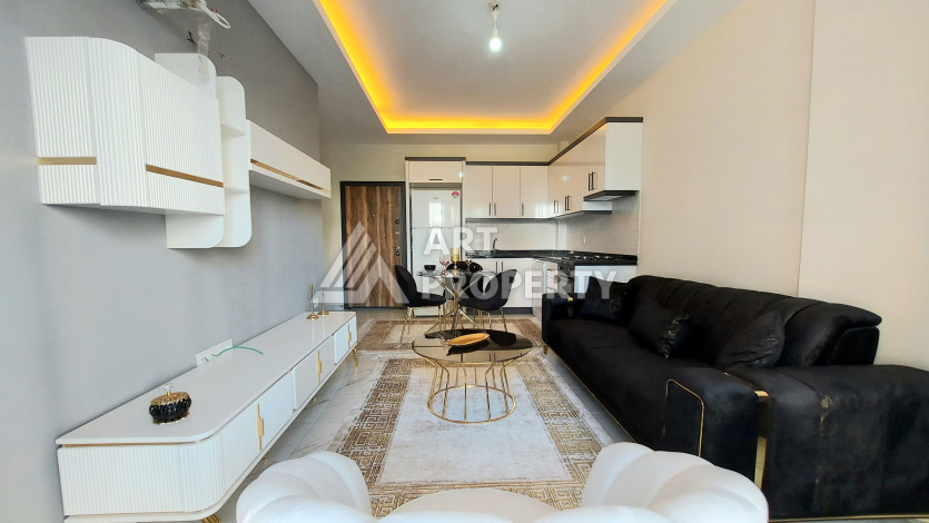 Меблированная квартира в новом доме в районе Махмутлар с планировкой 1+1, 5м2 - Ракурс 3