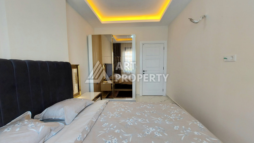 Меблированная квартира в новом доме в районе Махмутлар с планировкой 1+1, 5м2 - Ракурс 7