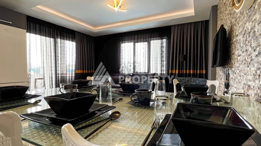 Просторные апартаменты в жилом комплексе с богатой инфраструктурой в районе Махмутлар с планировкой 2+1, 110м2 - Ракурс 3