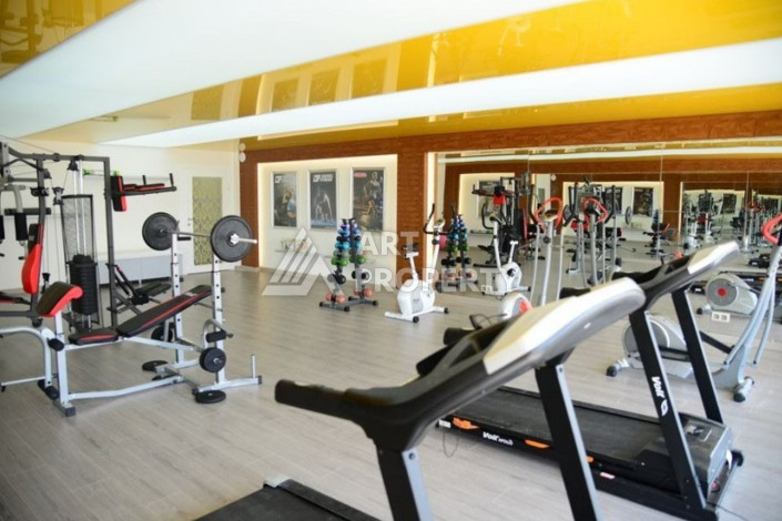 Просторные апартаменты в жилом комплексе с богатой инфраструктурой в районе Махмутлар с планировкой 2+1, 110м2 - Ракурс 19