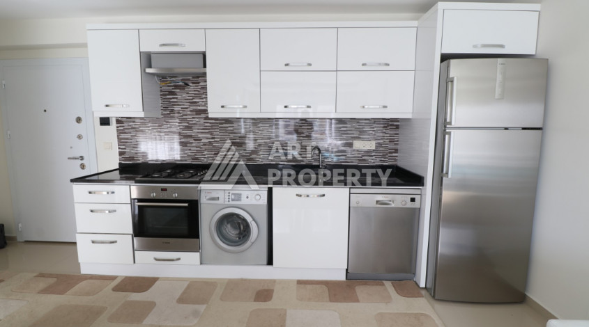 Квартира планировки 1+1 в курортном районе Махмутлар ,65м2 - Ракурс 3