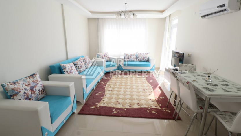 Квартира планировки 1+1 в курортном районе Махмутлар ,65м2 - Ракурс 5