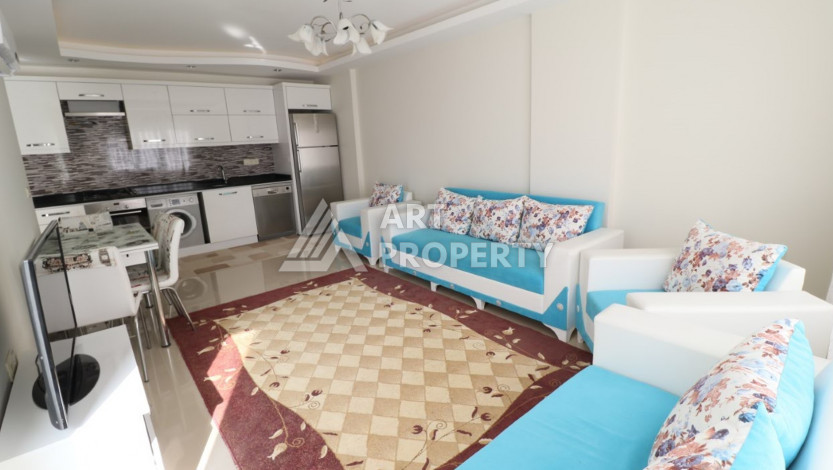 Квартира планировки 1+1 в курортном районе Махмутлар ,65м2 - Ракурс 6