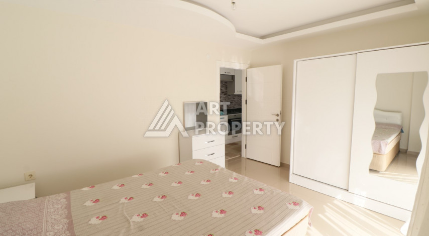 Квартира планировки 1+1 в курортном районе Махмутлар ,65м2 - Ракурс 8