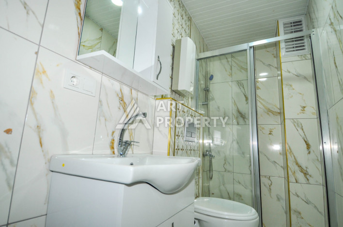 Дуплекс планировки 1+1 в районе Махмутлар, 55м2 - Ракурс 14