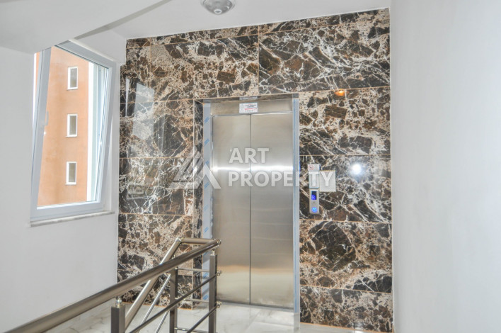 Дуплекс планировки 1+1 в районе Махмутлар, 55м2 - Ракурс 18