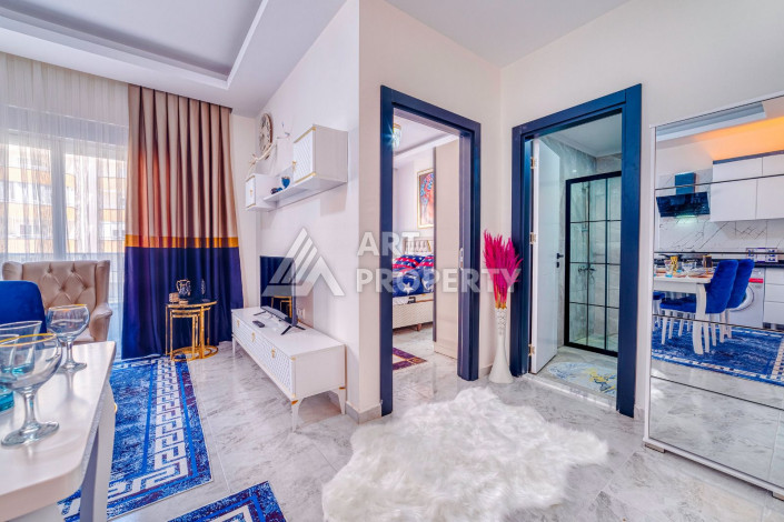 Квартира с дизайнерским ремонтом в центре Махмутлара, 55м2, планировка 1+1 - Ракурс 5