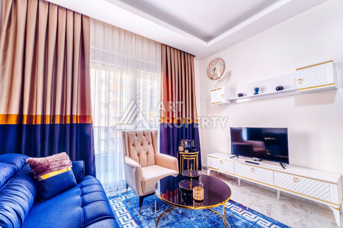 Квартира с дизайнерским ремонтом в центре Махмутлара, 55м2, планировка 1+1 - Ракурс 9