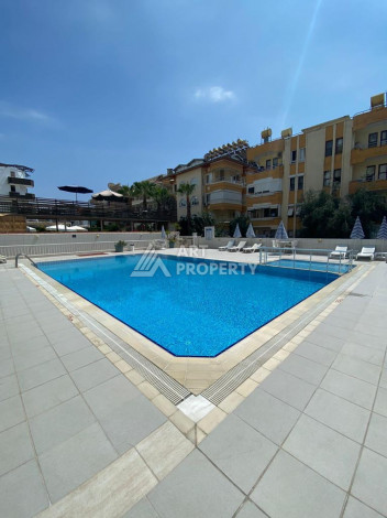 Меблированная квартира вблизи от моря в районе Оба с планировкой 1+1, 60м2 - Ракурс 2