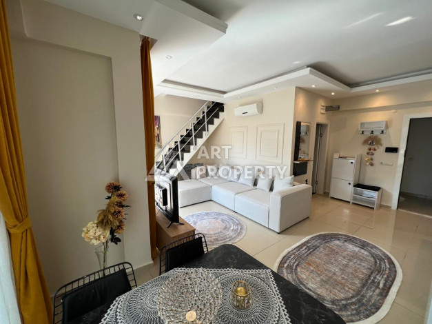 Апартаменты вблизи от популярного пляжа Клеопатра планировки 2+1, 106м2 - Ракурс 2