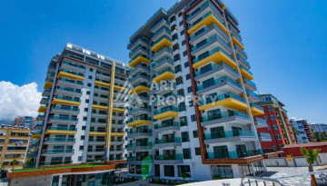 Апартаменты на первой береговой линии в великолепном комплексе в районе Махмутлар, 2+1, 90м2 - Ракурс 2