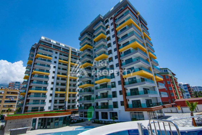 Апартаменты на первой береговой линии в великолепном комплексе в районе Махмутлар, 2+1, 90м2 - Ракурс 1