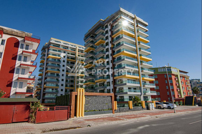 Апартаменты на первой береговой линии в великолепном комплексе в районе Махмутлар, 2+1, 90м2 - Ракурс 30