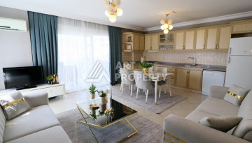 Апартаменты с мебелью в курортном районе Махмутлар планировки 2+1, 110м2 - Ракурс 2