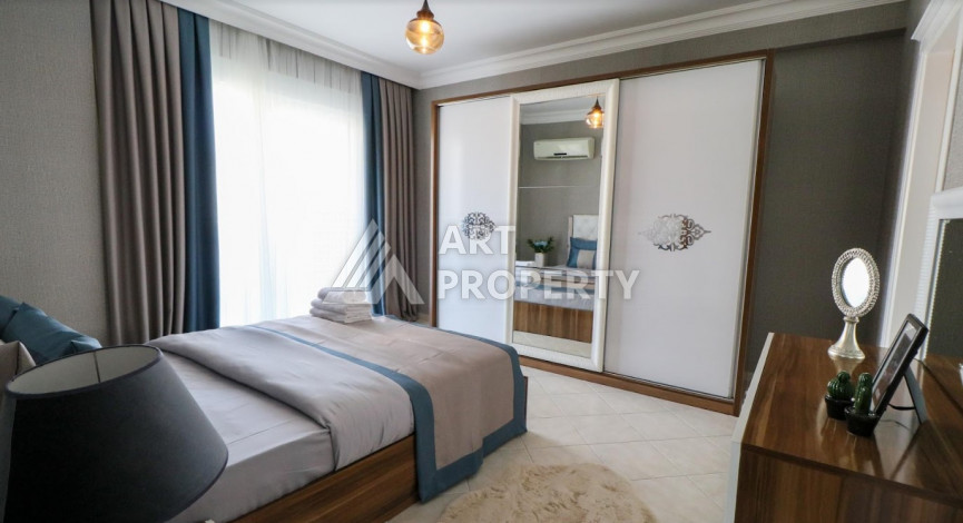 Апартаменты с мебелью в курортном районе Махмутлар планировки 2+1, 110м2 - Ракурс 11