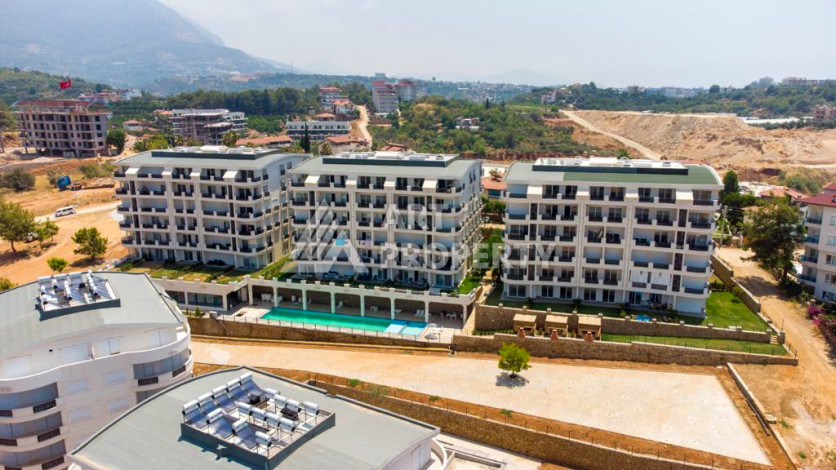 Меблированные апартаменты планировки 2+1 в престижном районе Оба, 70м2 - Ракурс 25