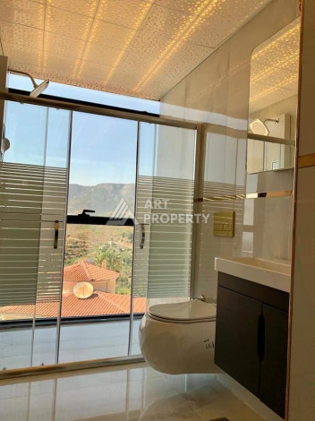 Новая вилла 4+1 с видами на море и горы в районе Каргыджак, 300 м2 - Ракурс 21