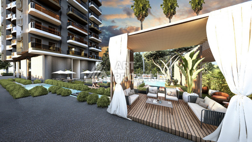 Инвестиционный проект с выгодной локацией в центре района Махмутлар! - Ракурс 4