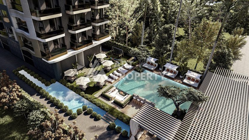 Инвестиционный проект с выгодной локацией в центре района Махмутлар! - Ракурс 7