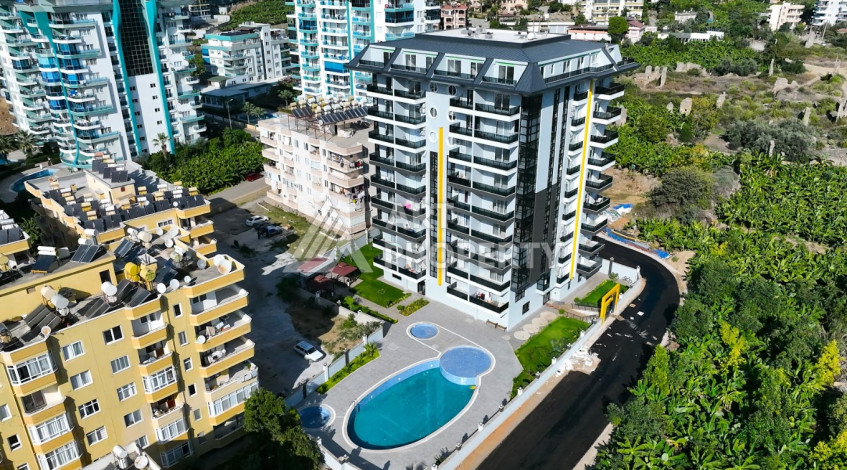 Апартаменты в жилом комплексе с развитой инфраструктурой в районе Махмутлар, 3+1,120м2 - Ракурс 18