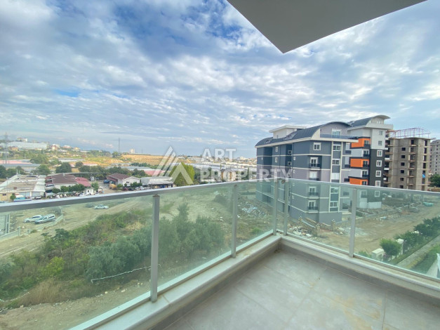 Апартаменты в живописном в районе Авсаллар планировки 1+1 - Ракурс 13